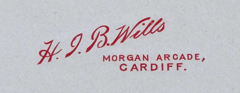Decorative text, "HJB Wills Morgan Arcade, Cardiff" from an old photo