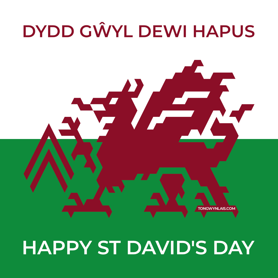 An illustration of a dragon with the Tongwylais.com logo. Includes text, "Dydd Gŵyl Dewi Hapus" and "Happy St David's Day".