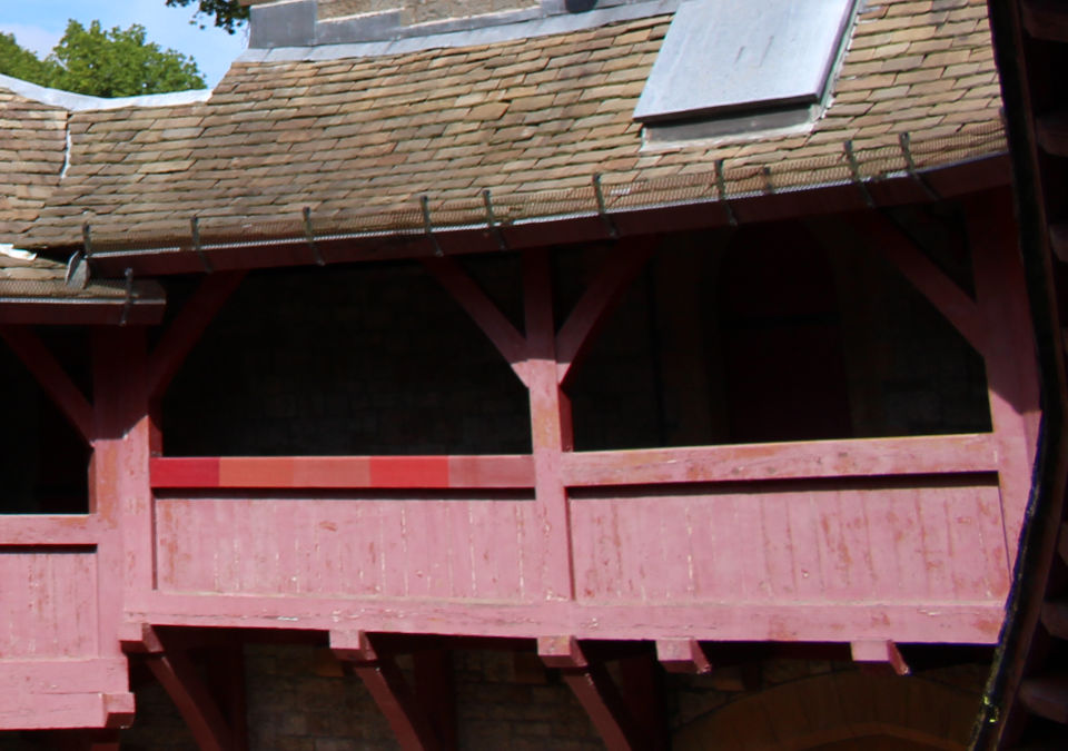 The balcony in Castell Coch from 2015 showing different colours of paint being tested